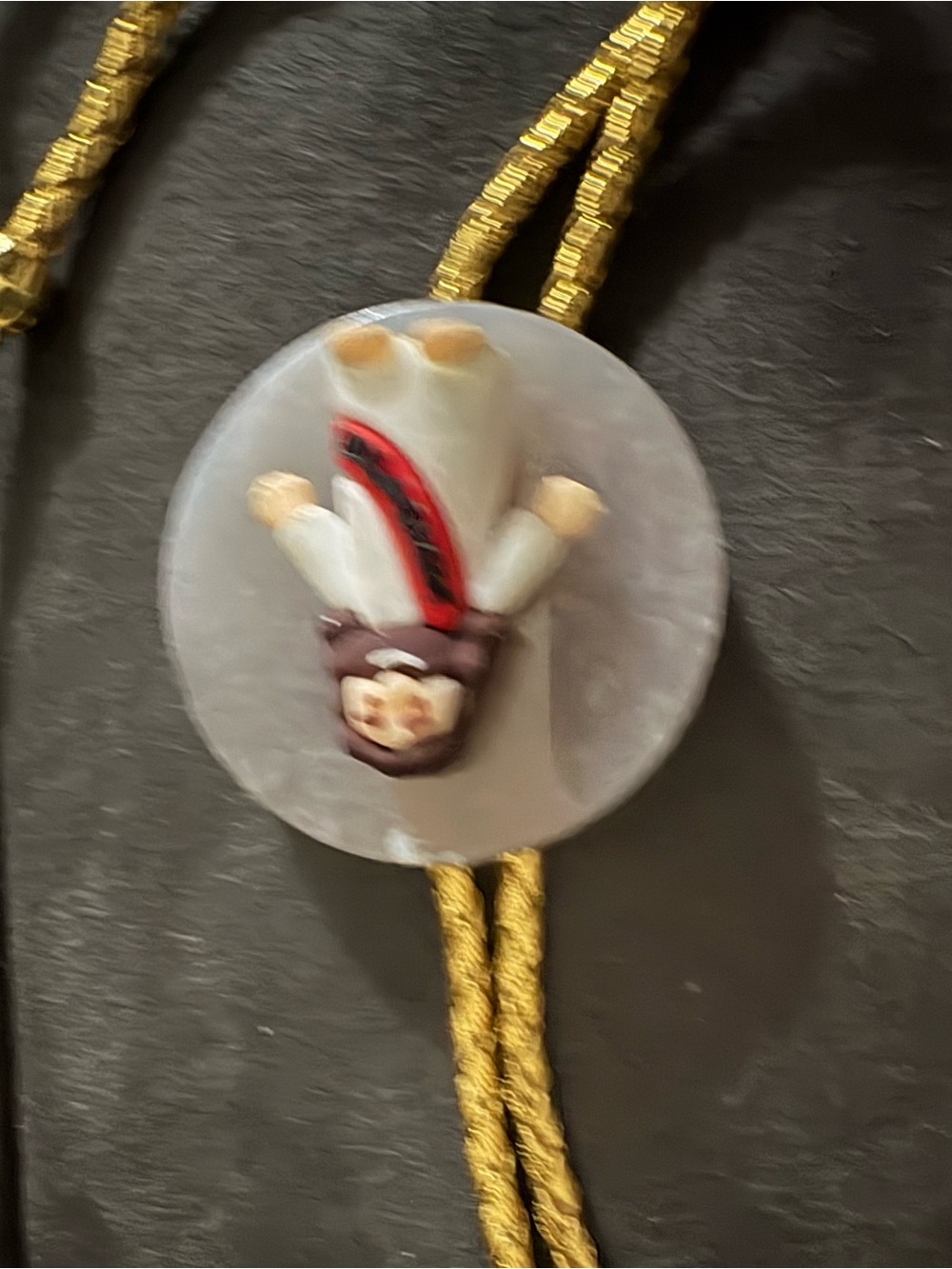Gold Cord Bolo Tie with White Mother-of-Pearl Center and Red Accent